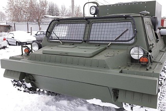 Отбойник усиленный; Защита стёкол; Поворотная фара-прожектор на кабине с защитой